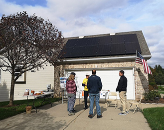 Solar panel on a house above the garage. 