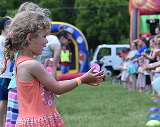 A young girl participating in a children