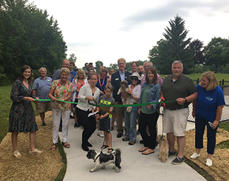 Small dog park ribbon cutting.